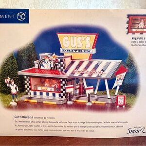 Department 56 – The Original Snow Village Gus’s Drive-In (Set of 7) – NIB